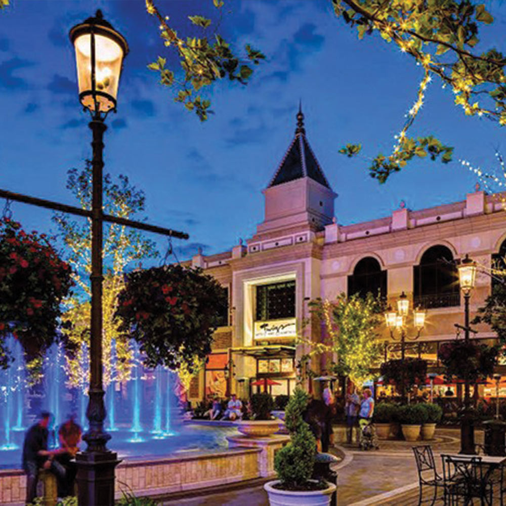 Station Park shopping and central fountain at night